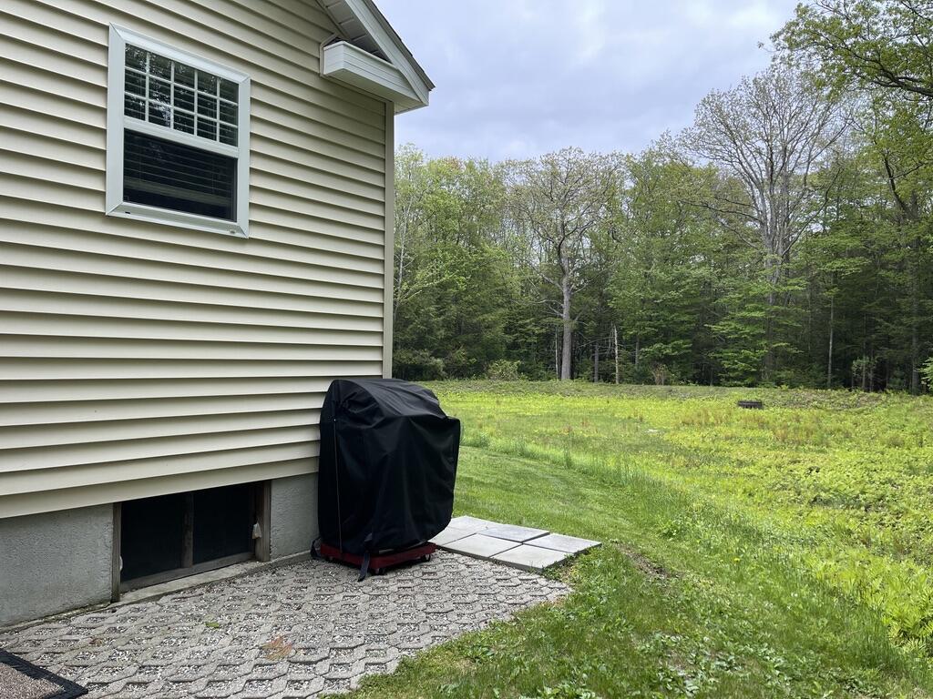 412 Post Road, Unit 253 Wells, ME 04090 - Photo 17 of 32 17. side patio off back door