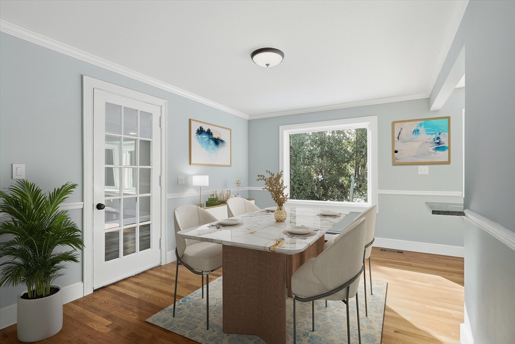 11 West Bradstreet Road North Andover, MA 01845 - Photo 11 of 42 a view of a dining room with furniture window and wooden floor