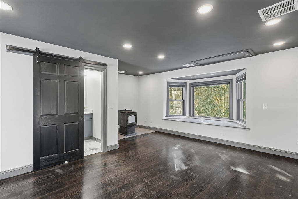 11 West Bradstreet Road North Andover, MA 01845 - Photo 17 of 42 an empty room with windows and closet