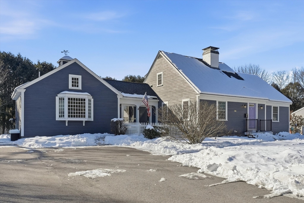 11 West Bradstreet Road North Andover, MA 01845 - Photo 40 of 42 a front view of a house with a yard covered in snow