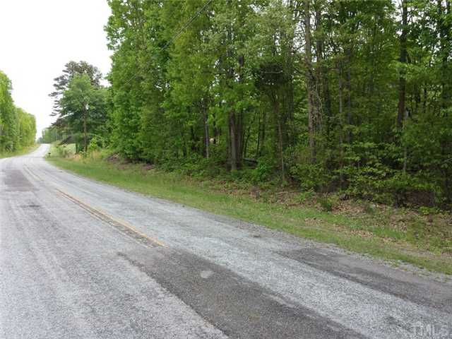0 Jack Hambrick Road, Unit 1 Roxboro, NC 27574 - Photo 1 of 3 a view of a yard with a trees