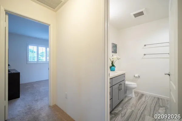 a bathroom with a toilet and a sink