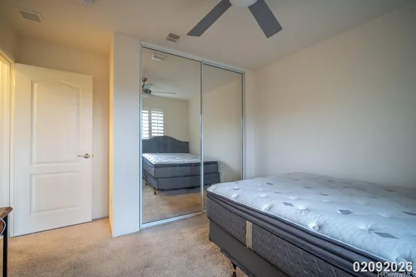 a bedroom with a bed and furniture