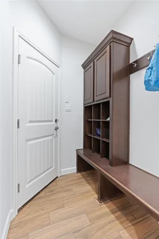 a view of closet area with empty racks