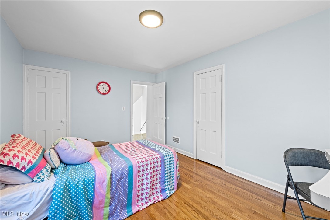 2471 Channing Road Cleveland, OH 44118 - Photo 20 of 33 Bedroom with baseboards, and wood finished floors