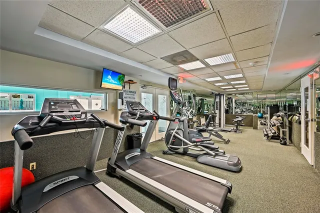 a view of swimming pool with chairs