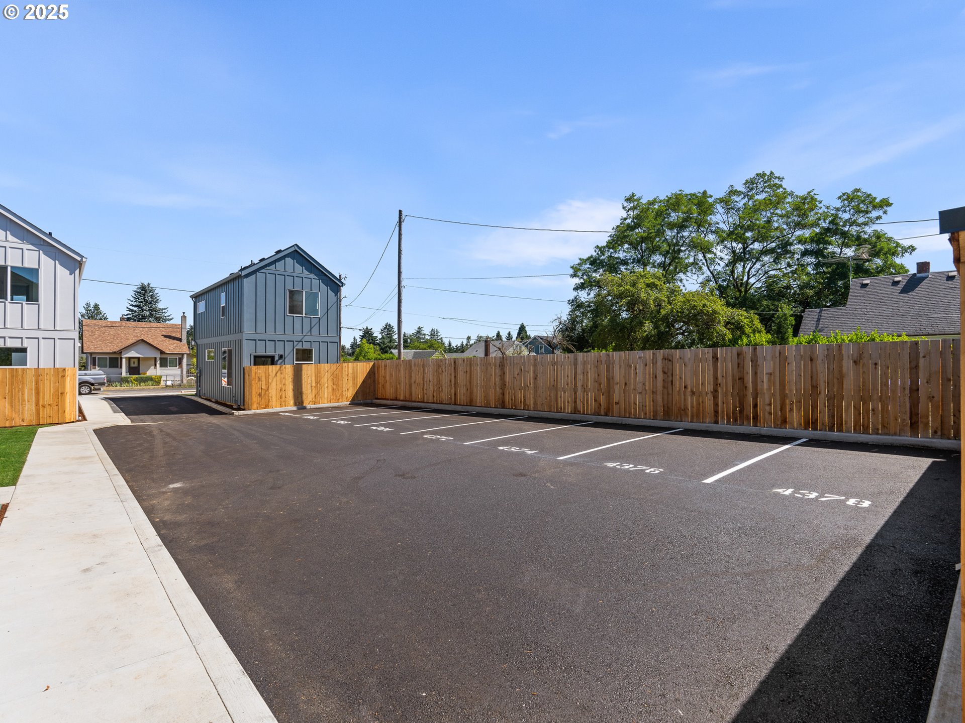 4366 Northeast Going Street Portland, OR 97218 - Photo 13 of 14 a view of a street with a small yard