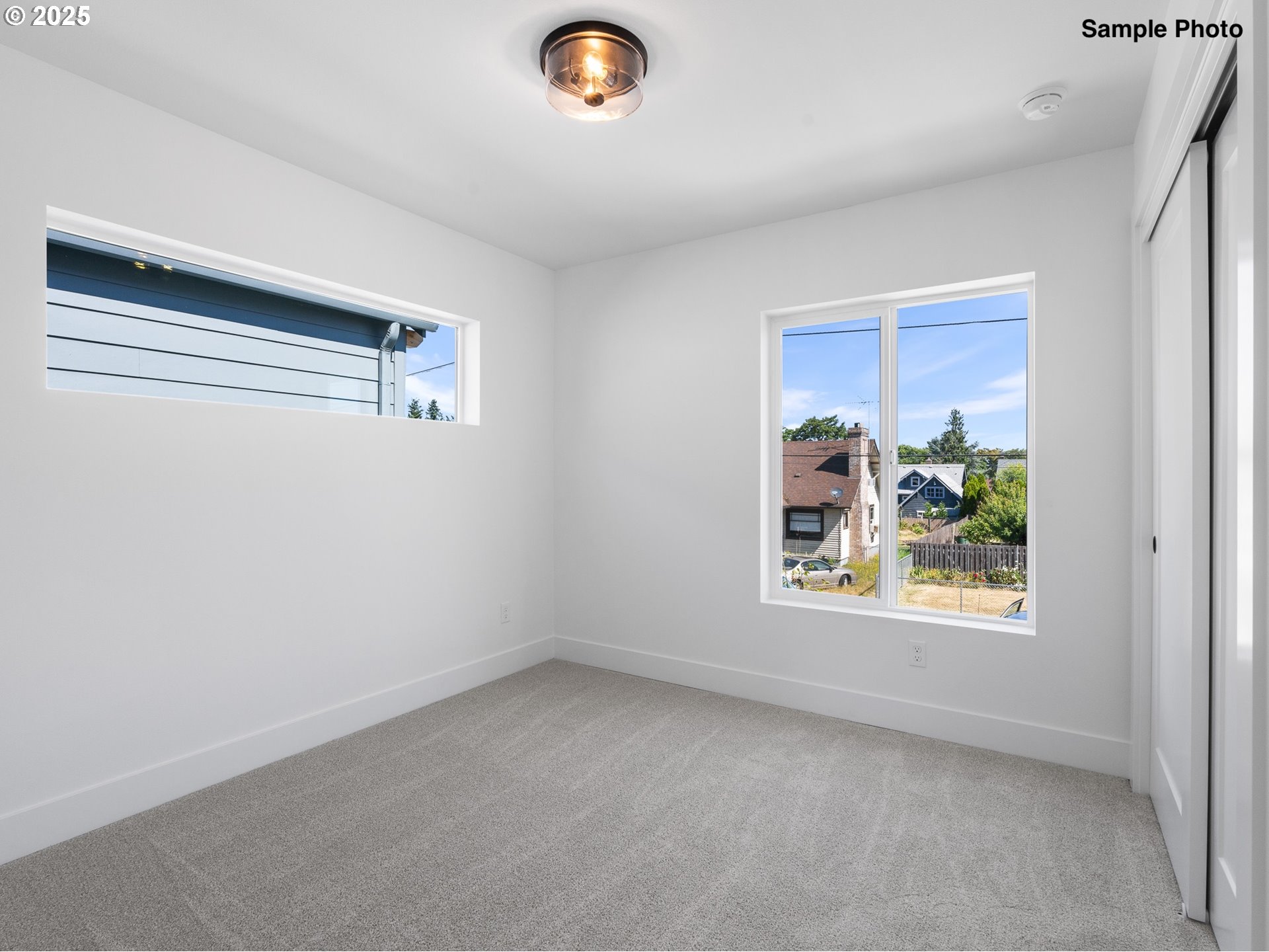 4366 Northeast Going Street Portland, OR 97218 - Photo 9 of 14 a view of an empty room with a window