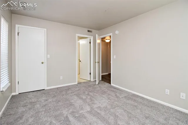 a bathroom with a toilet a sink and shower