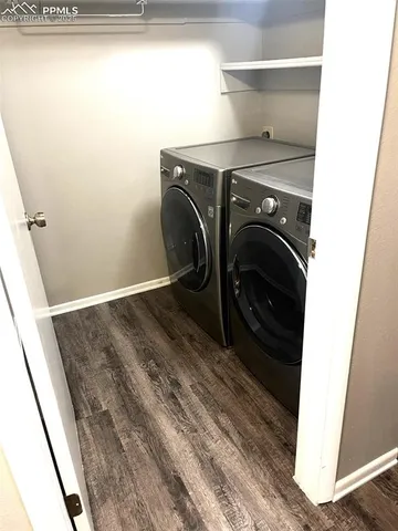 a view of a house with a yard and plants