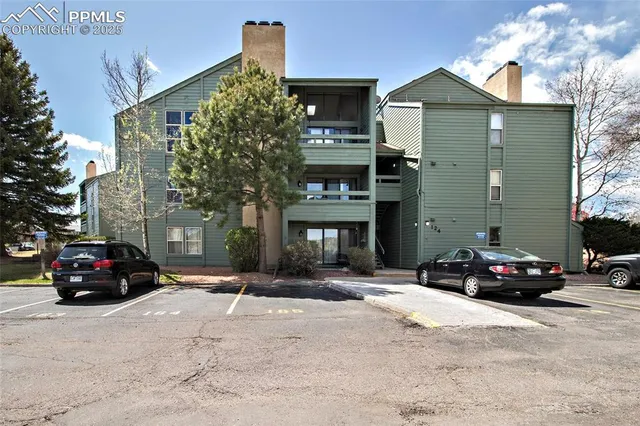a backyard of a house with seating space