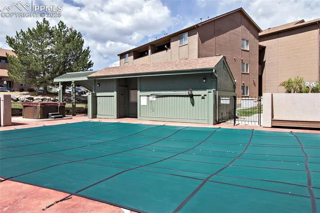 a view of a field with an trees