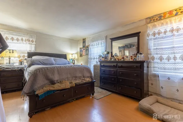 a view of bathroom with a sink and a mirror