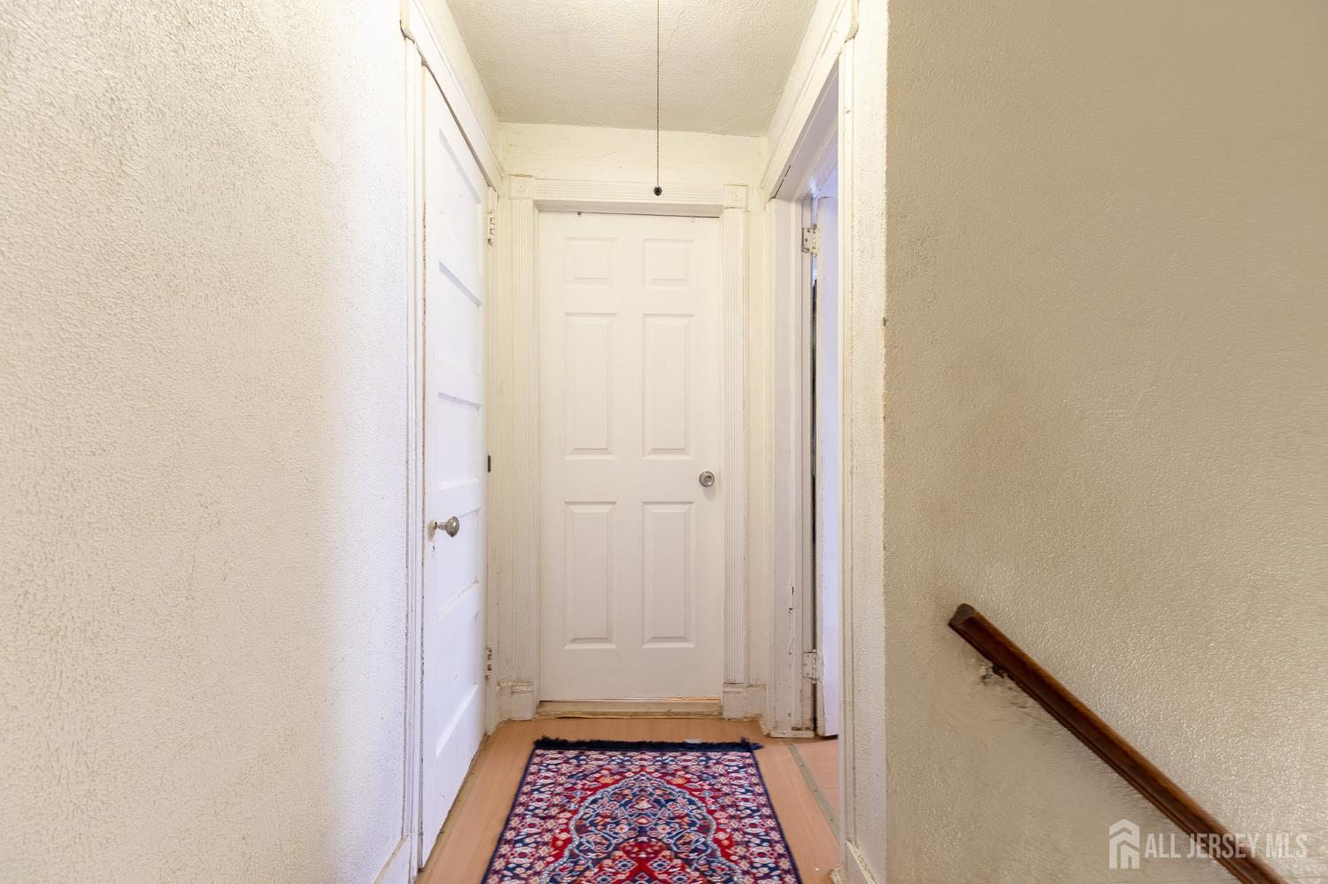 48 Locust Street Carteret, NJ 07008 - Photo 16 of 27 a view of bathroom with a sink and a mirror