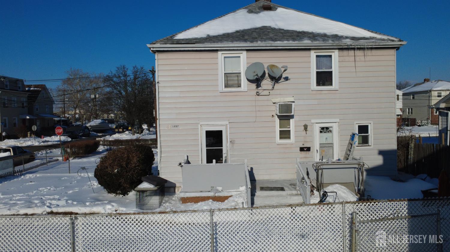 48 Locust Street Carteret, NJ 07008 - Photo 2 of 27 a view of a house with backyard and sitting area
