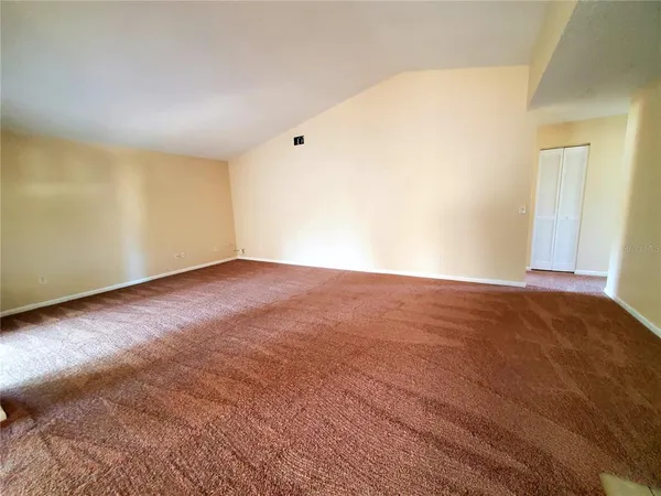 an empty room with a natural light