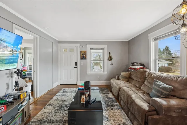 a bed room with furniture and a window