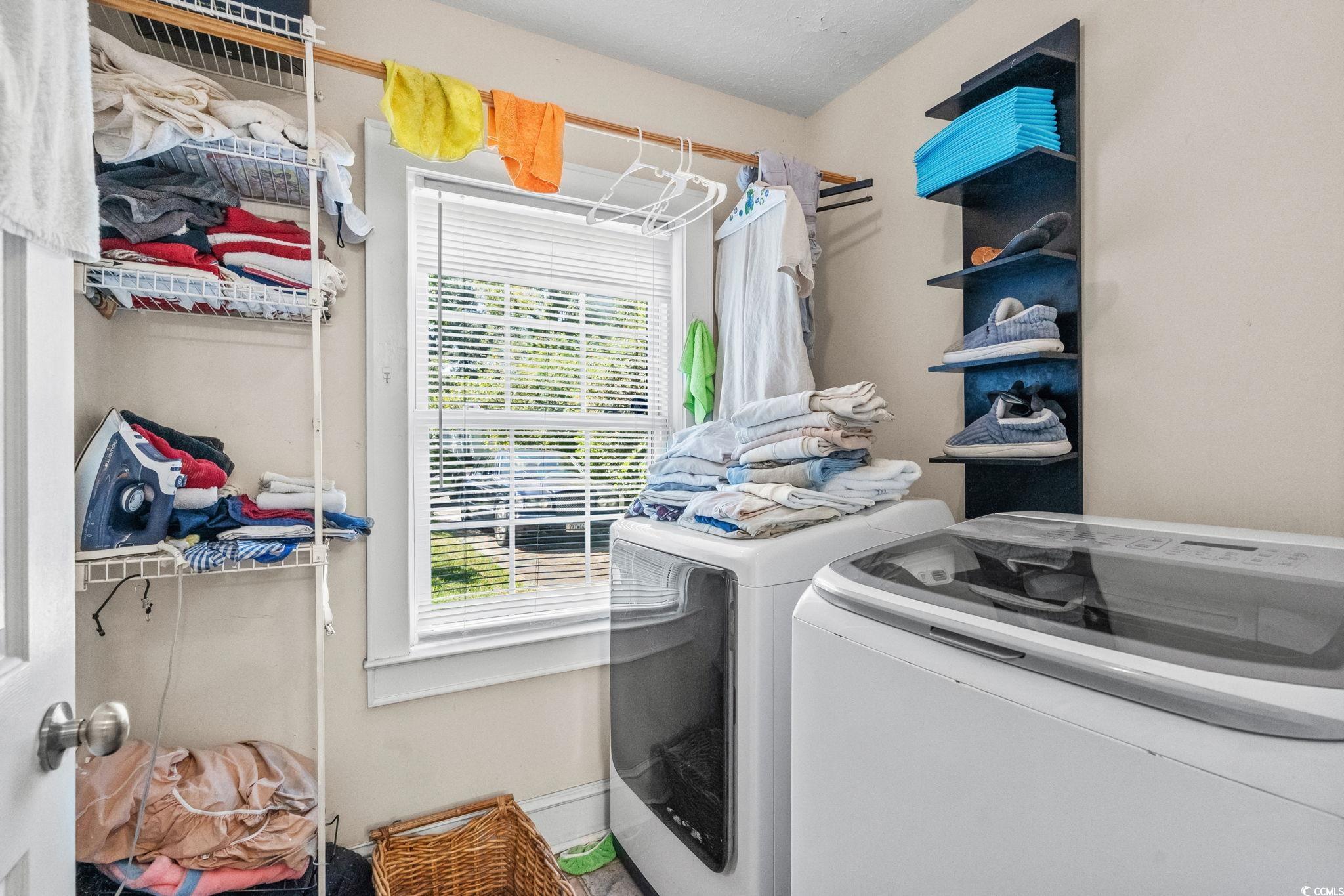 159 Brookgate Drive Myrtle Beach, SC 29579 - Photo 26 of 40 Laundry room with washer and clothes dryer
