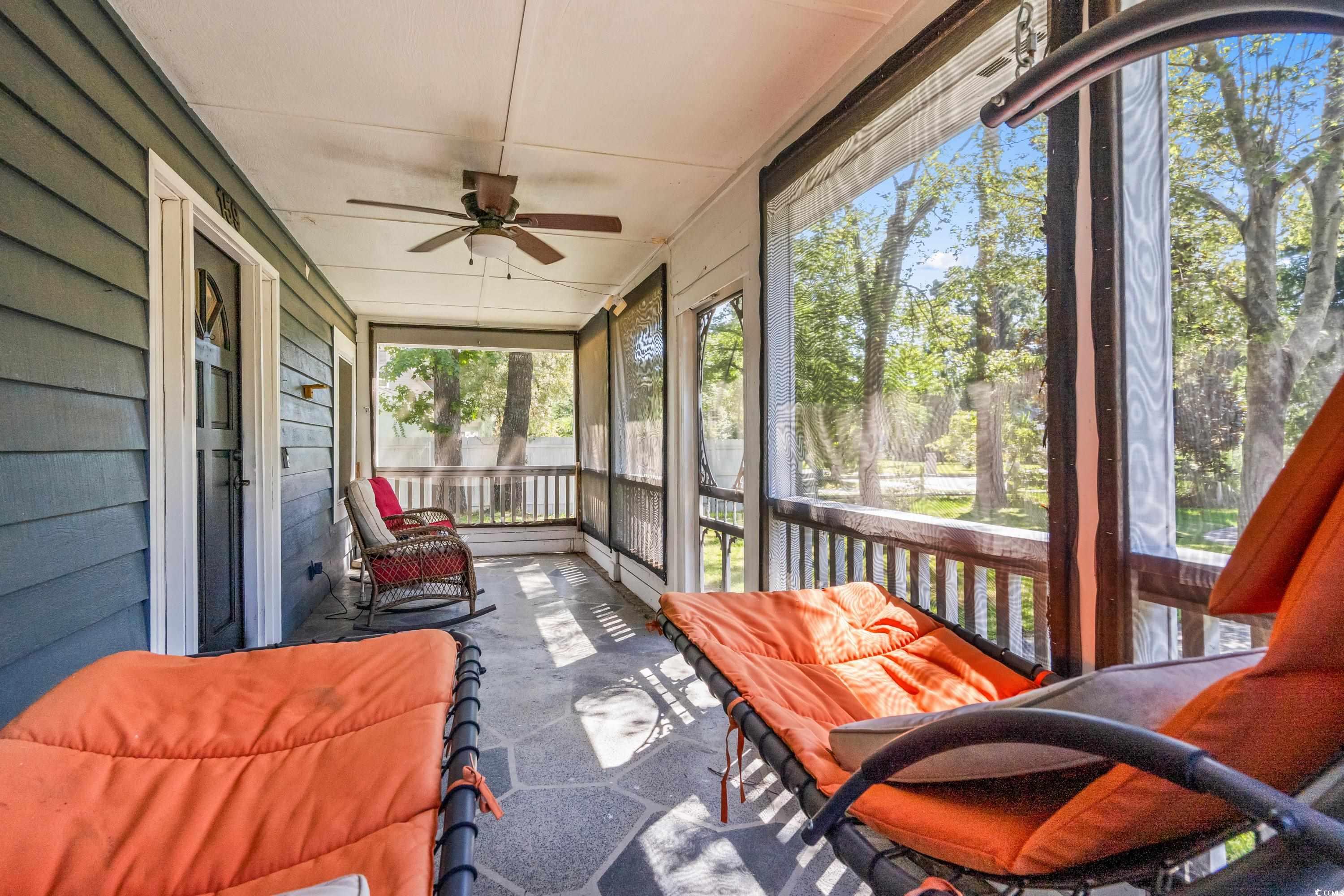 159 Brookgate Drive Myrtle Beach, SC 29579 - Photo 3 of 40 Front Porch/ solarium featuring ceiling fan