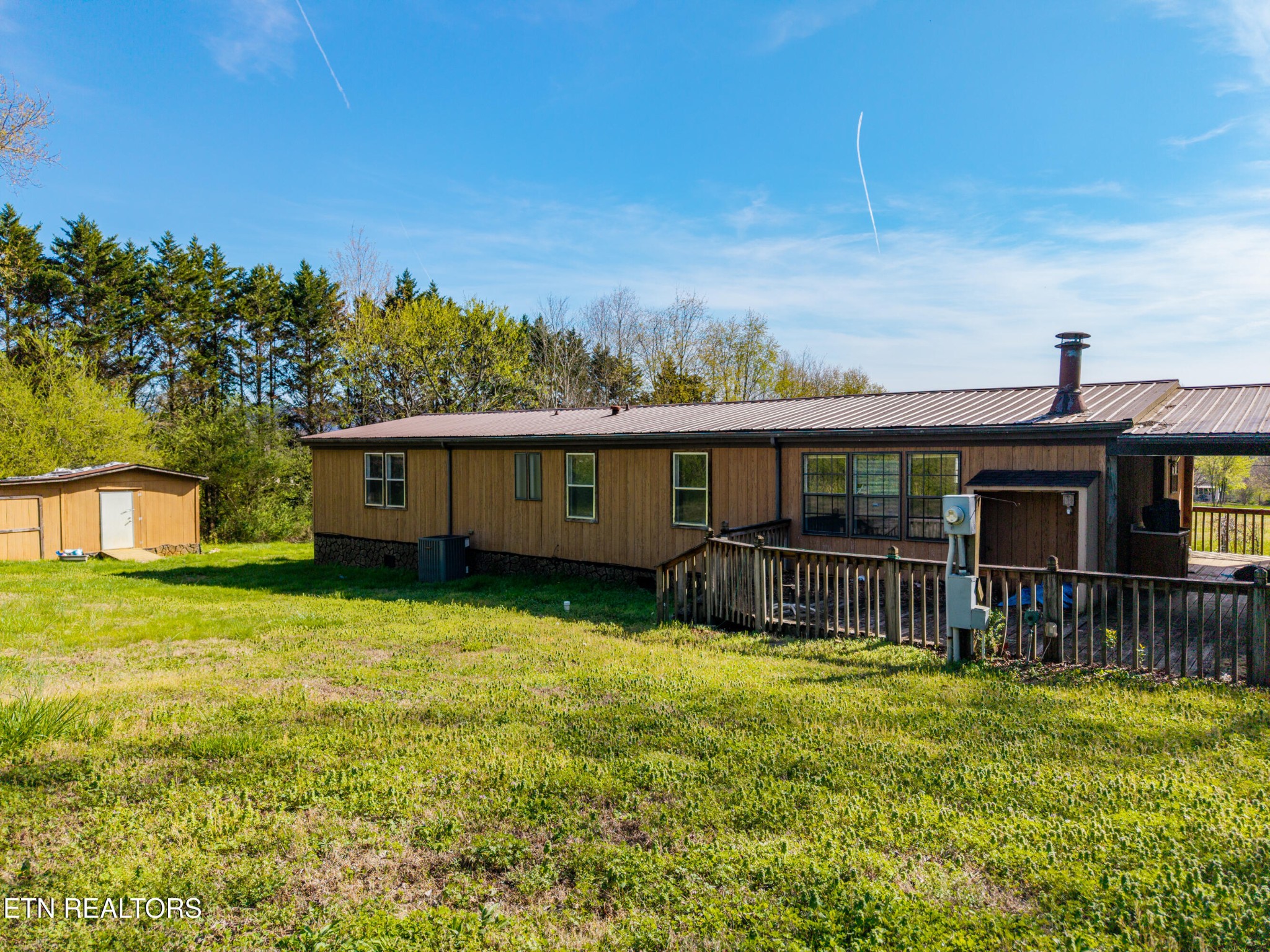 337 River Ford Road Maryville, TN 37804 - Photo 24 of 33 a view of a house with a backyard