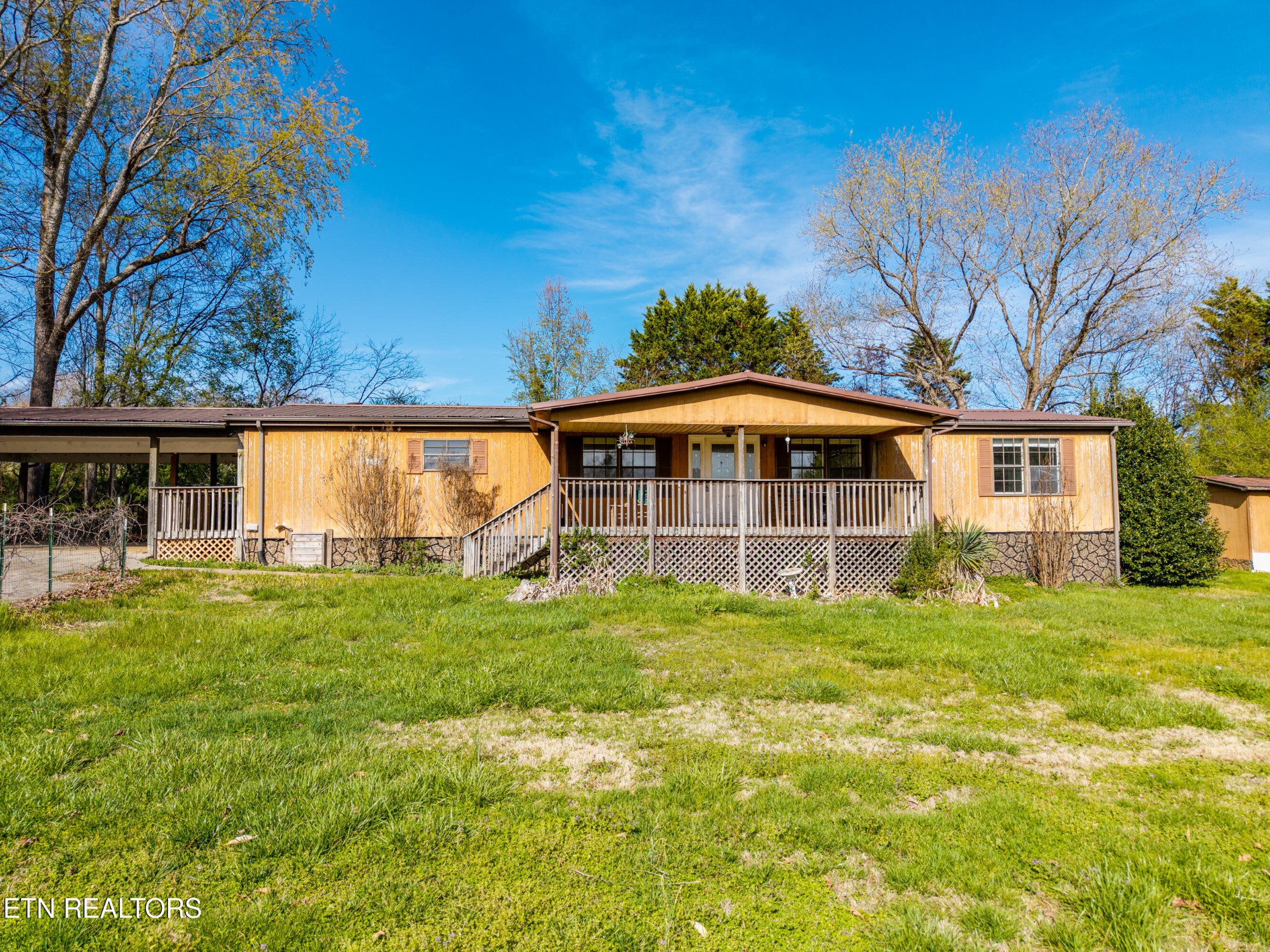 337 River Ford Road Maryville, TN 37804 - Photo 3 of 33 a view of a house with a backyard