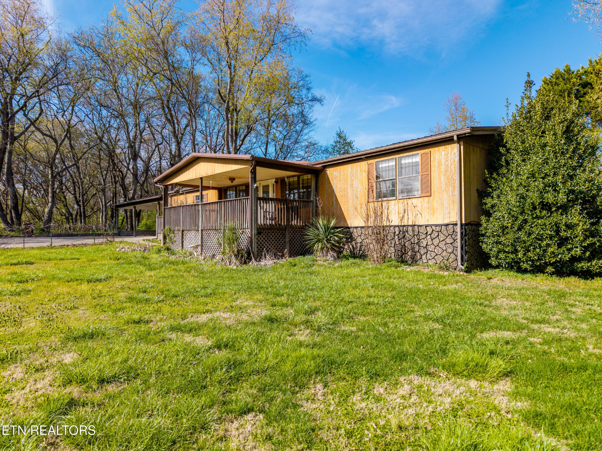 337 River Ford Road Maryville, TN 37804 - Photo 4 of 33 a view of a house with a backyard