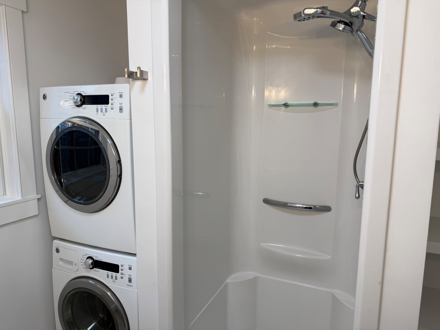 106 Old South Road, Unit A B Nantucket, MA 02554 - Photo 15 of 24 a view of a hallway with washer and dryer