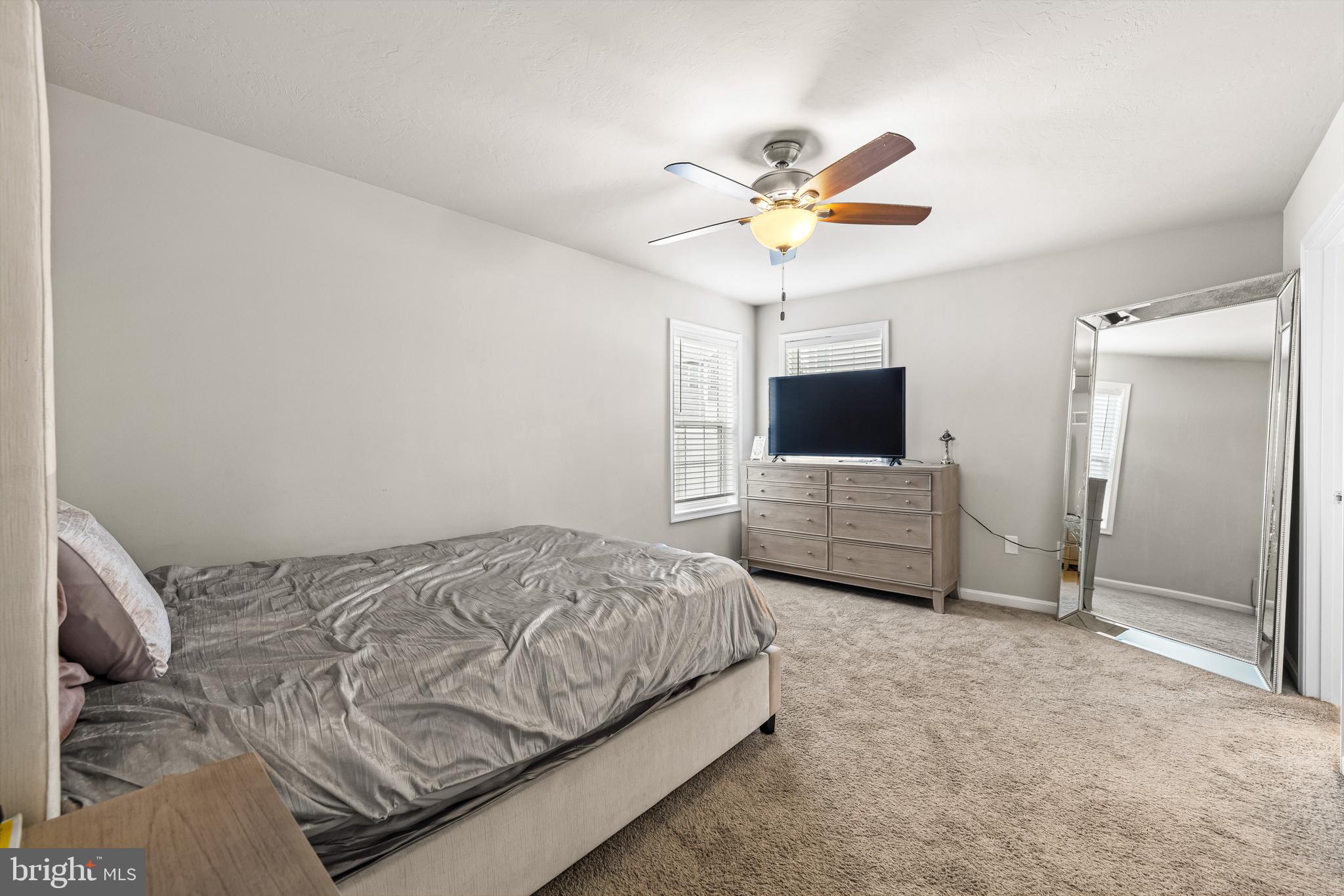 177 Skyview Circle Hanover, PA 17331 - Photo 11 of 18 a bedroom with a bed and a flat screen tv