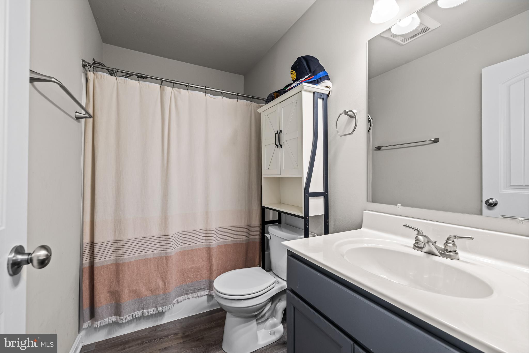 177 Skyview Circle Hanover, PA 17331 - Photo 16 of 18 a bathroom with a sink toilet and shower