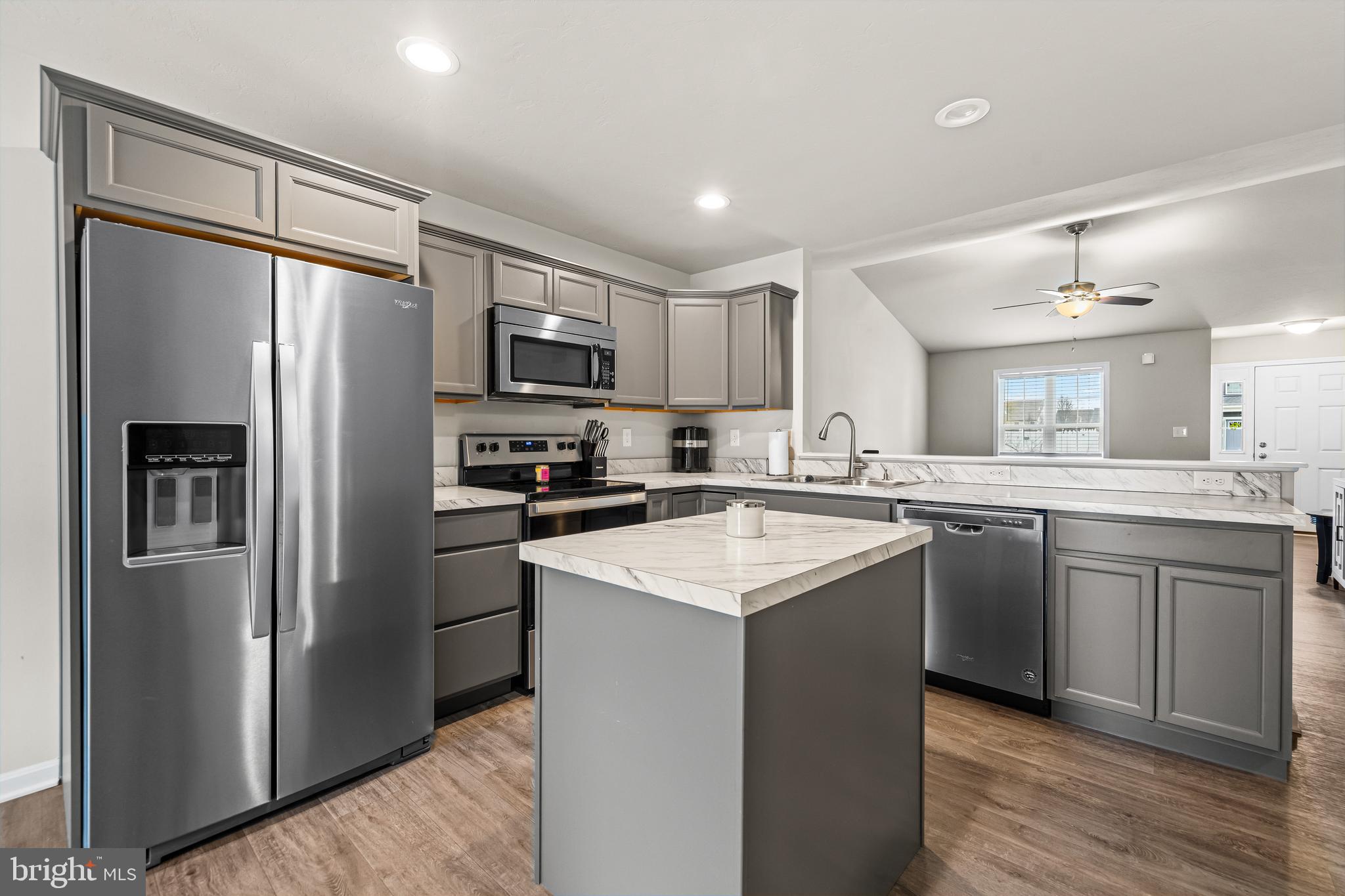 177 Skyview Circle Hanover, PA 17331 - Photo 7 of 18 a kitchen with a refrigerator a sink and cabinets