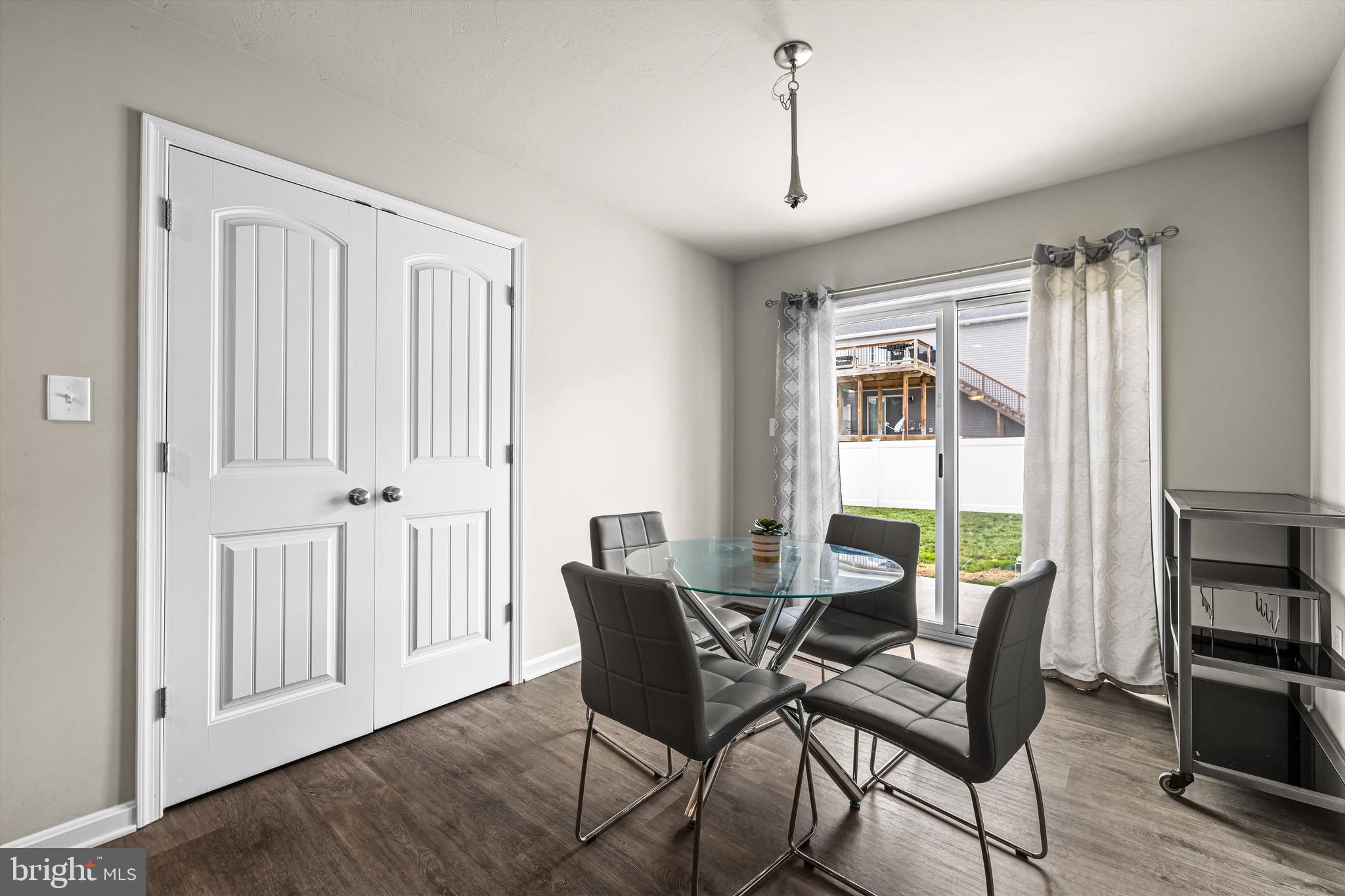 177 Skyview Circle Hanover, PA 17331 - Photo 9 of 18 a view of a dining room with furniture window and wooden floor