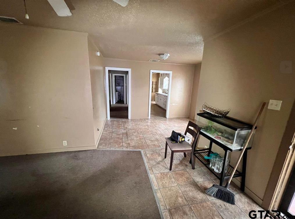 242 East Main Street Van, TX 75790 - Photo 12 of 20 a view of a hallway with seating area