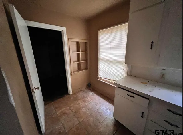 a bathroom with a sink and toilet