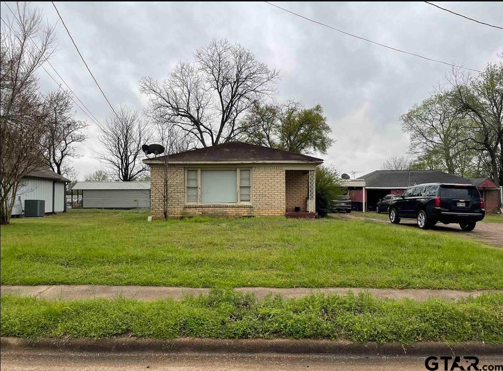242 East Main Street Van, TX 75790 - Photo 2 of 20 a view of a house with a back yard