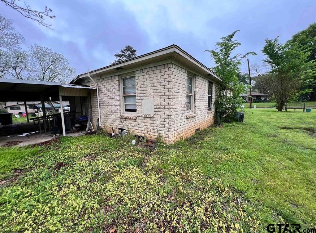 242 East Main Street Van, TX 75790 - Photo 4 of 20 a view of a house with a yard