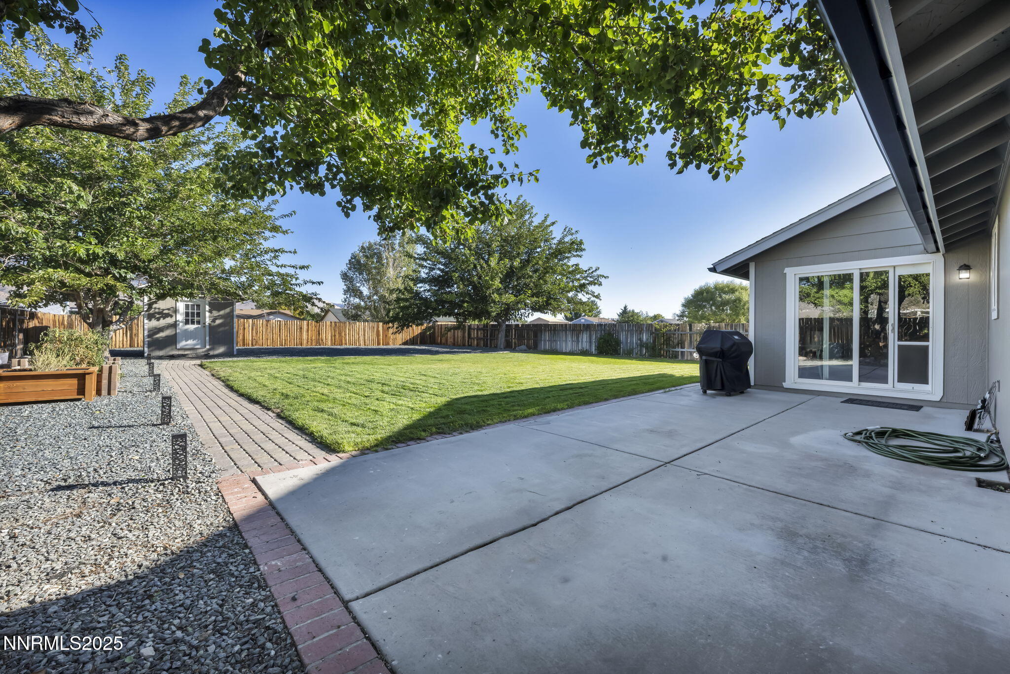 216 Gordon Lane Dayton, NV 89403 - Photo 14 of 16 a view of a house with a yard