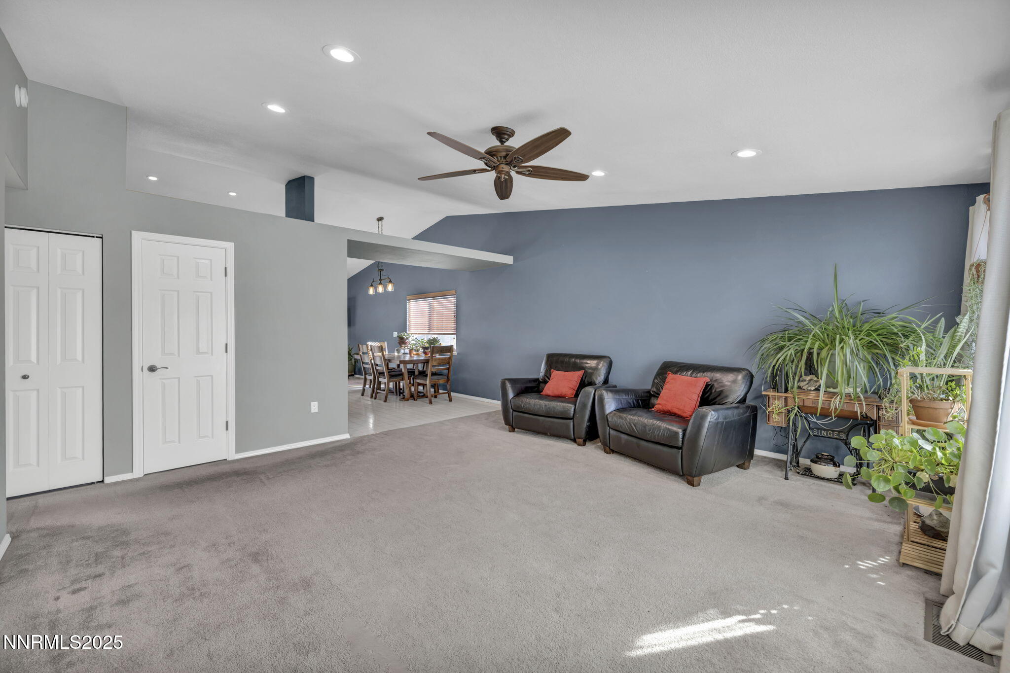 216 Gordon Lane Dayton, NV 89403 - Photo 7 of 16 a living room with furniture and a potted plant