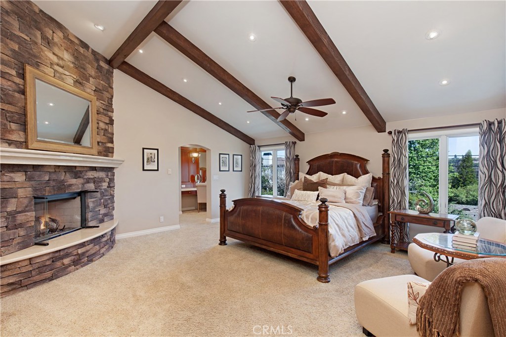 13032 St Thomas Drive North Tustin, CA 92705 - Photo 14 of 32 a spacious bedroom with a bed couch and window