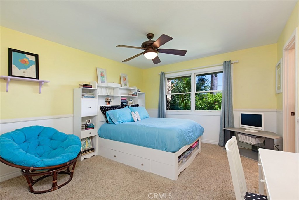 13032 St Thomas Drive North Tustin, CA 92705 - Photo 24 of 32 a living room with furniture and a mirror