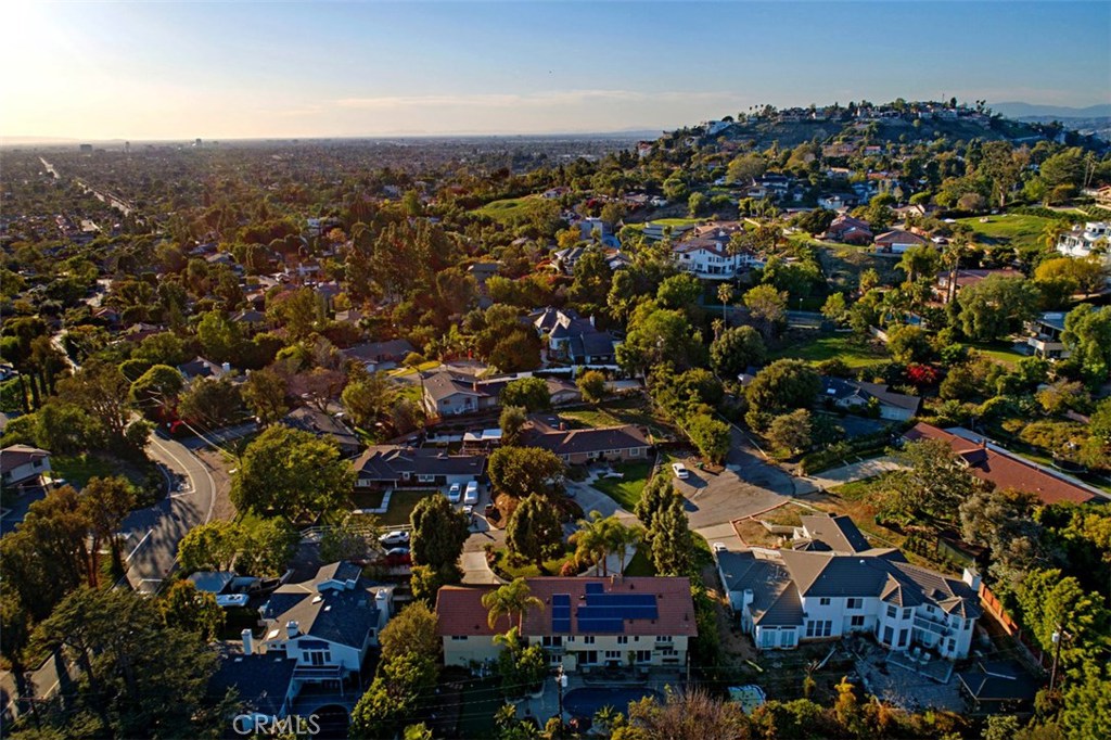 13032 St Thomas Drive North Tustin, CA 92705 - Photo 5 of 32 an aerial view of residential building with parking and yard