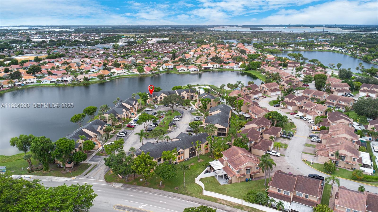 an aerial view of city and lake
