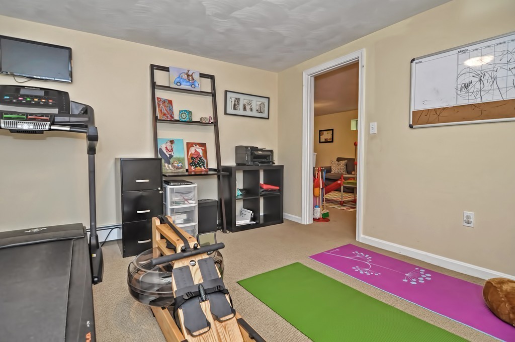 10 Pilgrim Road Wellesley, MA 02481 - Photo 20 of 25 a view of a room with gym equipment