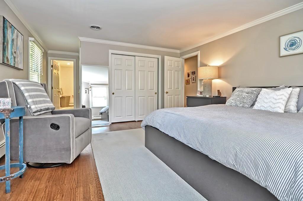 10 Pilgrim Road Wellesley, MA 02481 - Photo 10 of 25 a bedroom with a bed and a couch