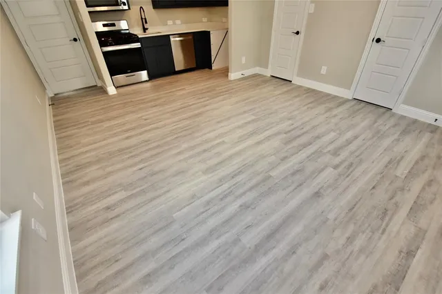 a living room with a bed