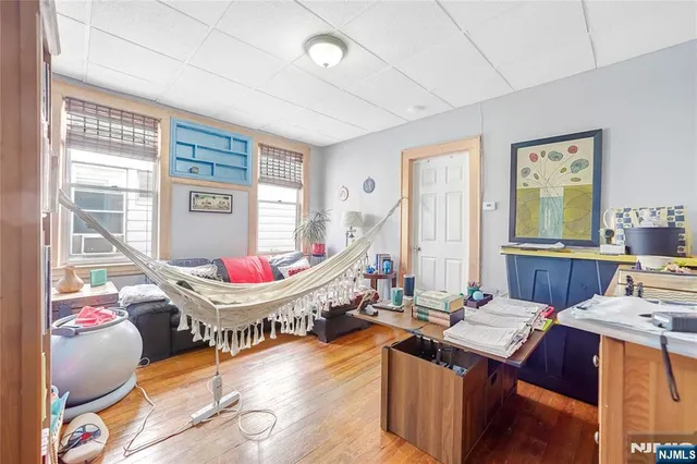 a room with gym equipment and window