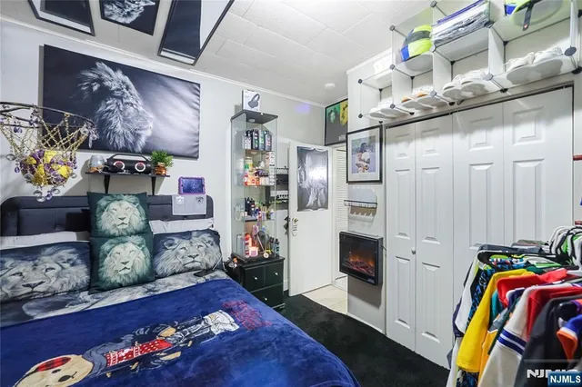 a bed room with a bed and a couch