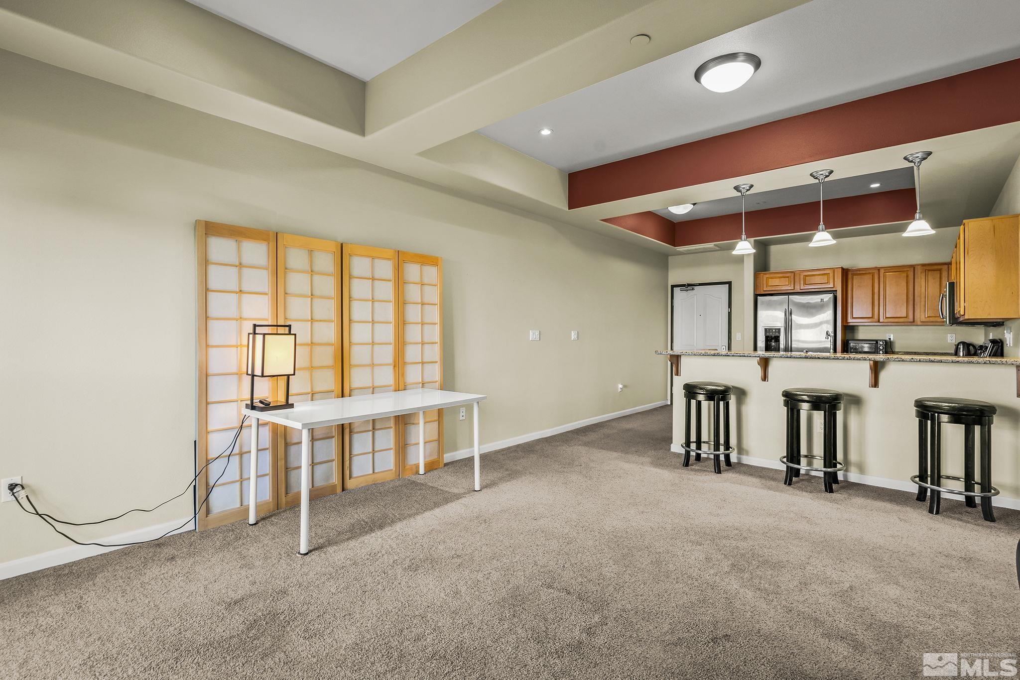 200 West 2nd Street, Unit 202 Reno, NV 89501 - Photo 11 of 18 an empty room with windows and view of chair