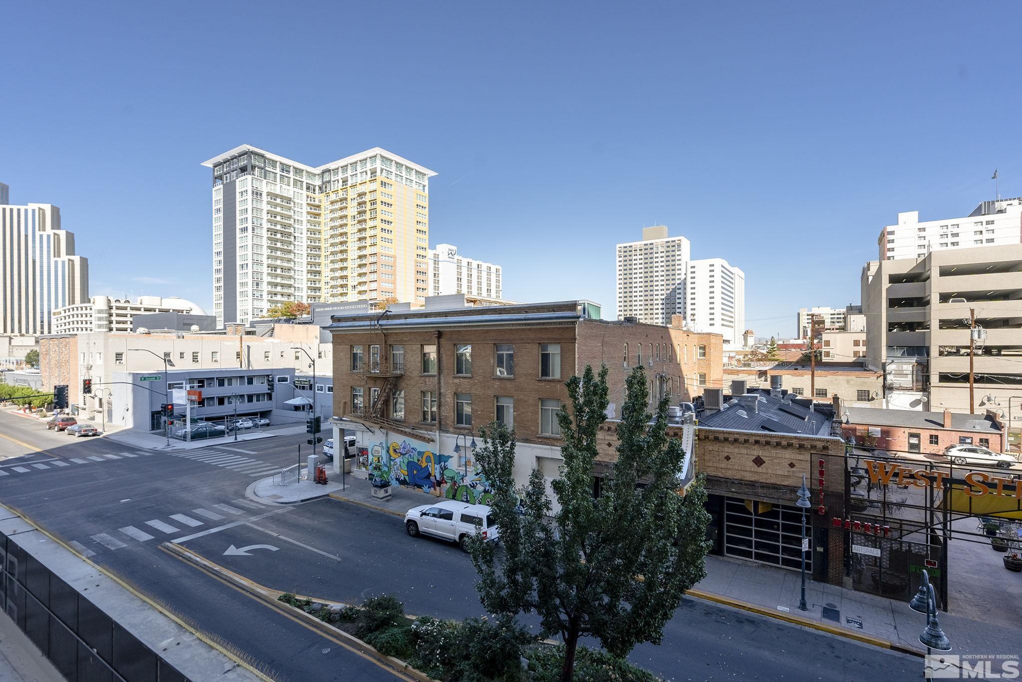 200 West 2nd Street, Unit 202 Reno, NV 89501 - Photo 17 of 18 a front view of a house with a yard