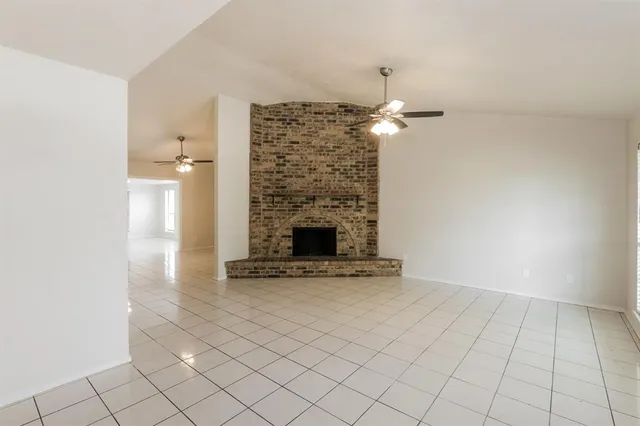 a view of a livingroom with a fireplace