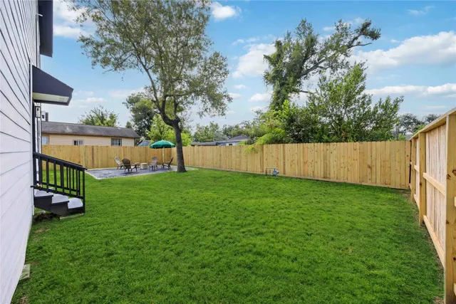a view of a backyard with a garden